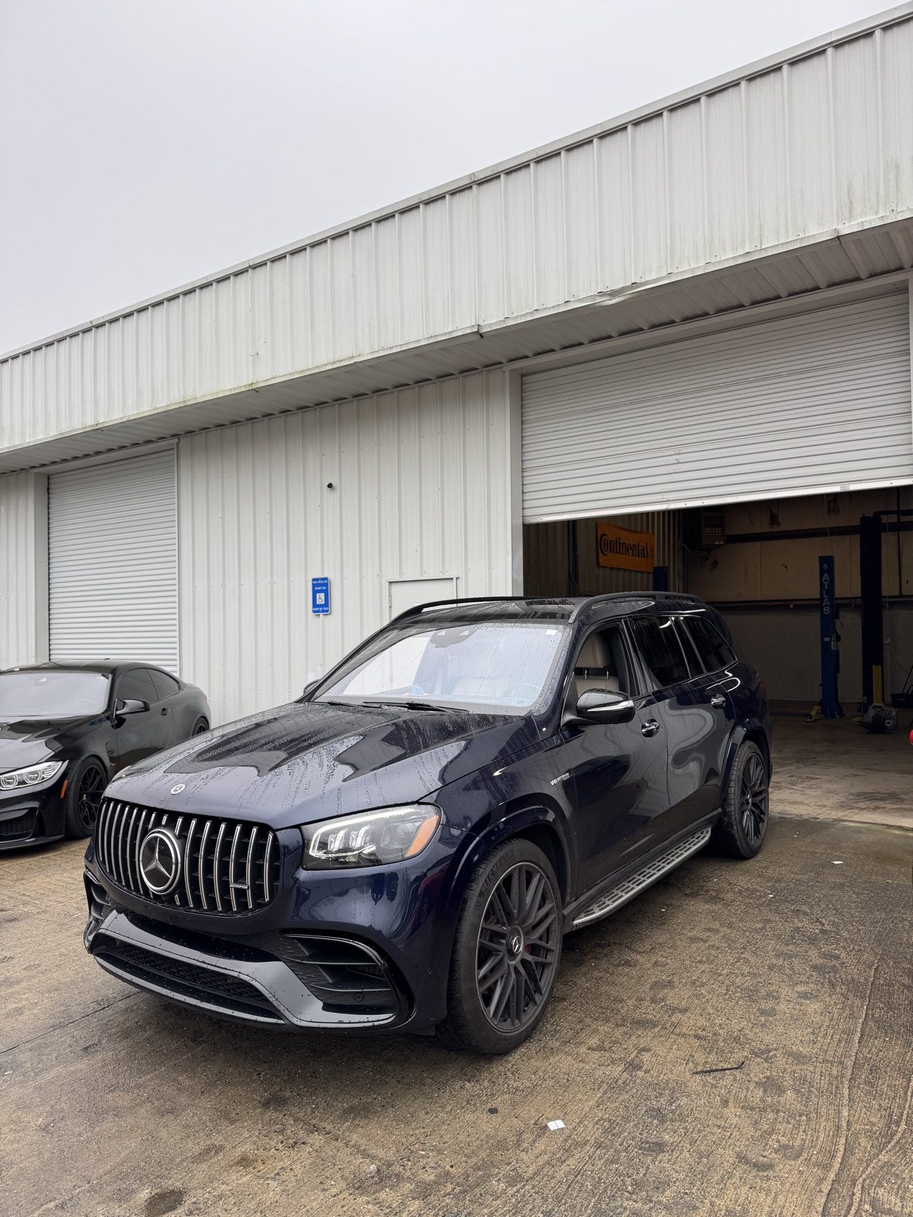 Dark blue Mercedes-AMG GLS 63 SUV at Auto Haus Solutions in Cumming, GA