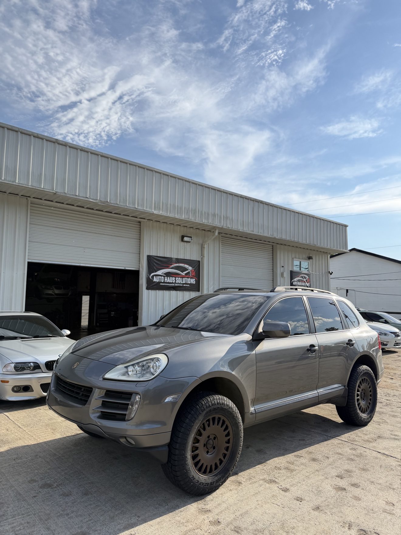 Gray Porsche Cayenne at Auto Haus Solutions